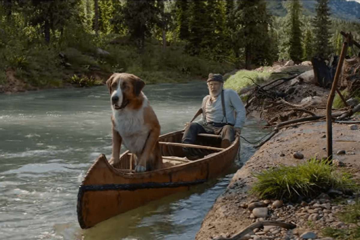 カヌーで川を下る犬とハリソンフォード